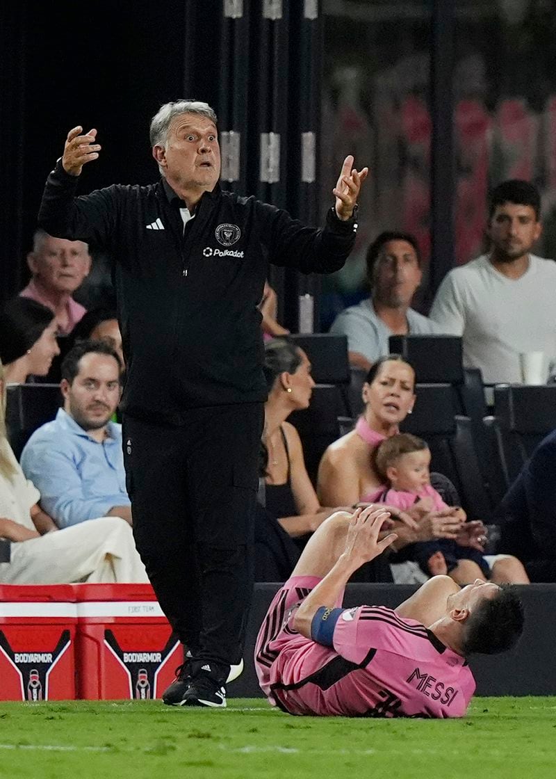 Inter Miami head coach Tara Mendoza reacts to a call by a referee after Inter Miami forward Lionel Messi (10) collided with a Philadelphia Union player during the second half of an MLS soccer match, Saturday, Sept. 14, 2024, in Fort Lauderdale, Fla. (AP Photo/Marta Lavandier)