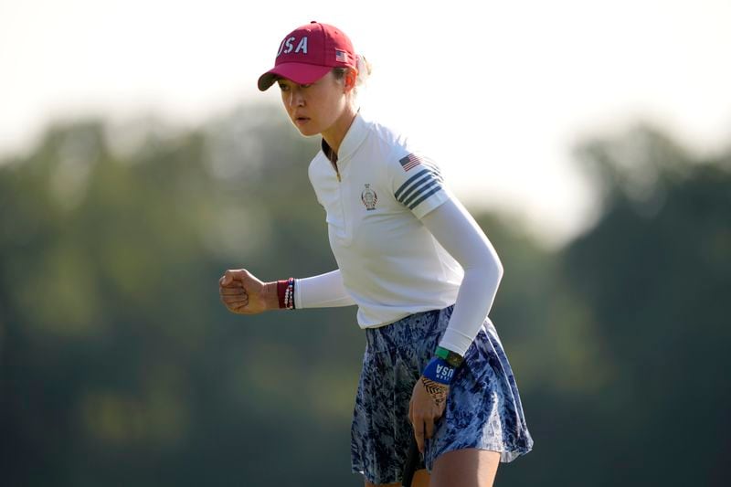 United States' Nelly Korda celebrates after sinking a putt on the 10th hole during a Solheim Cup golf tournament foursome match at Robert Trent Jones Golf Club, Saturday, Sept. 14, 2024, in Gainesville, Va. (AP Photo/Matt York)