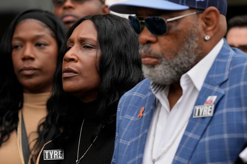 RowVaughn Wells, center, mother of Tyre Nichols, listens during a news conference outside the federal courthouse during the trial of three former Memphis police officers accused of killing her son Wednesday, Sept. 25, 2024, in Memphis, Tenn. (AP Photo/George Walker IV)