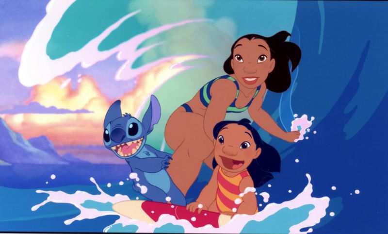 Lilo, Nani and Stitch surfing during the “Hawaiian Roller Coaster Ride” sequence from “Lilo & Stitch.” (Walt Disney Pictures/Entertainment Pictures/Zuma Press/TNS)