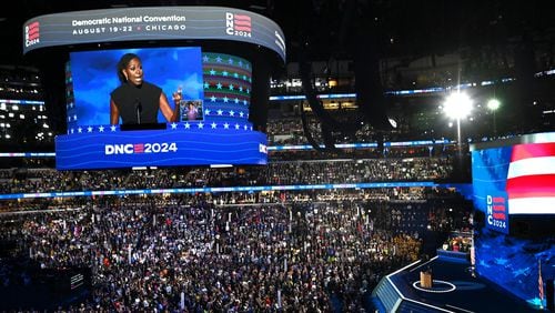 Michelle Obama speaks Tuesday, the second day of the Democratic National Convention in Chicago. (Hyosub Shin / AJC)