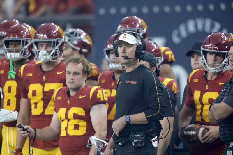 Southern California head coach Lincoln Riley watches a play during the first half of an NCAA college football game against LSU, Sunday, Sept. 1, 2024, in Las Vegas. (AP Photo/Steve Marcus)