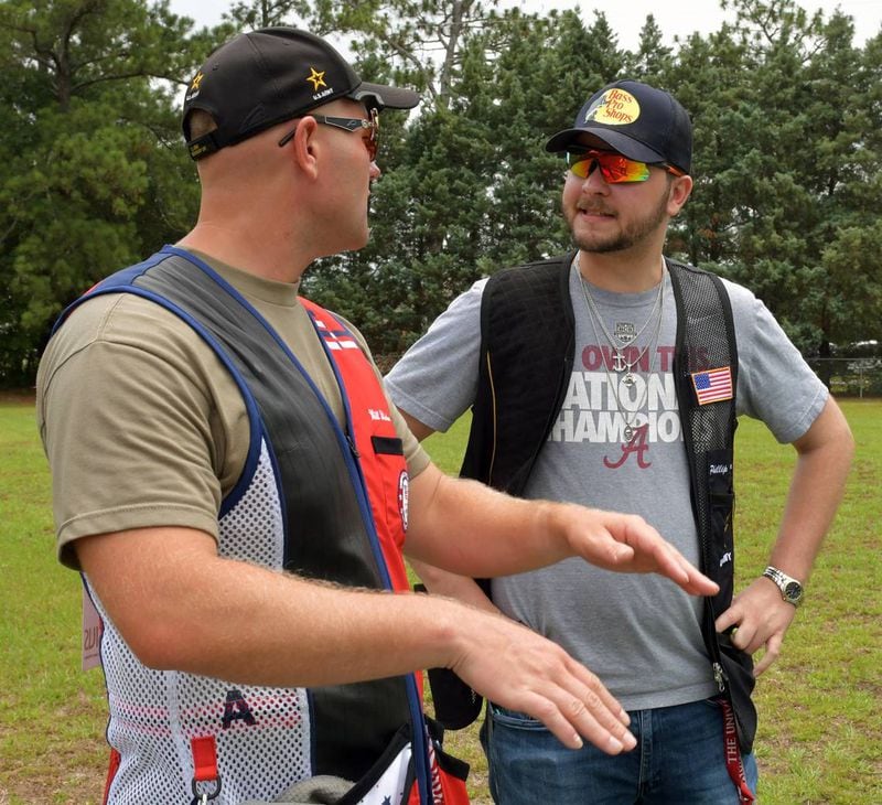 Sgt. Will Hinton, left, talks with Ledger-Enquirer reporter Kelby Hutchison prior to shooting trap at Ft. Moore. (Photo Courtesy of Darrell Roaden/Ledger-Enquirer)