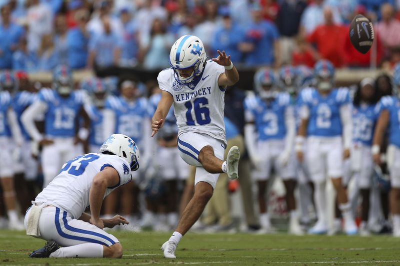 Kentucky's Alex Raynor (16) kicks a field goal during the first half of an NCAA college football game against Mississippi Saturday, Sept. 28, 2024, in Oxford, Miss. (AP Photo/Randy J. Williams)