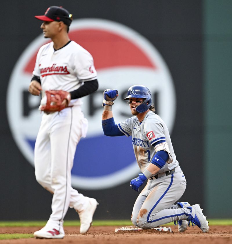 Kansas City Royals' Bobby Witt Jr. (7) celebrates hitting a double during the third inning of the second game of a baseball doubleheader against the Cleveland Guardians, Monday, August 26, 2024, in Cleveland. (AP Photo/Nick Cammett)