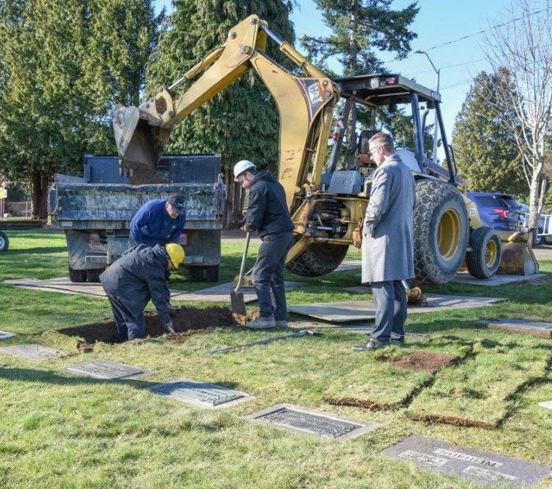 This 2019 photo  shows the grave of Frank Wypych being exhumed in a search for evidence in the cold case of the murder of Susan Galvin. The 20-year-old police records clerk was found raped and strangled in a parking garage elevator at the Seattle Center on July 9, 1967, after she failed to show up for work. Seattle cold case detectives on Tuesday, May 7, 2019, announced that DNA evidence from clothes worn by Galvin when she died has been linked to the genetic profile of Wypych, who was a 26-year-old security guard when Galvin was killed. Wypych died of diabetes complications in 1987.