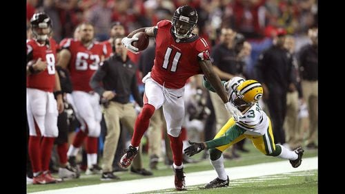 Julio Jones of the Atlanta Falcons runs after a catch for a 73 yard touchdown against Damarious Randall of the Green Bay Packers in the third quarter in the NFC Championship Game at the Georgia Dome on January 22, 2017 in Atlanta, Georgia. (Photo by Rob Carr/Getty Images)