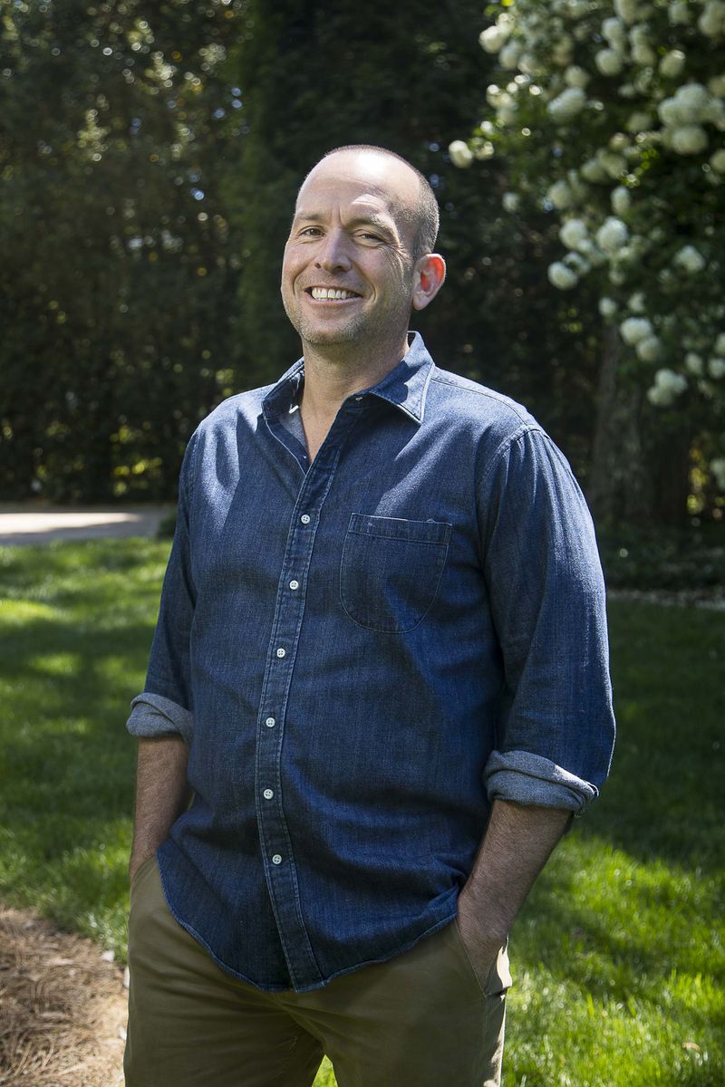 04/10/2020 - Brookhaven, Georgia  - Comedian and podcast host Paul Ollinger stands for a photo at his at his Brookhaven residence, Friday, April 10, 2020. Ollinger hosts the podcast "Crazy Money" from his home. (ALYSSA POINTER / ALYSSA.POINTER@AJC.COM)