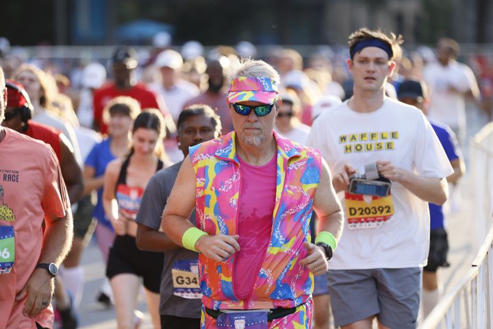 Runners start at the 55th running of the Atlanta Journal-Constitution Peachtree Road Race in Atlanta on Thursday, July 4, 2024.   (Miguel Martinez / AJC)