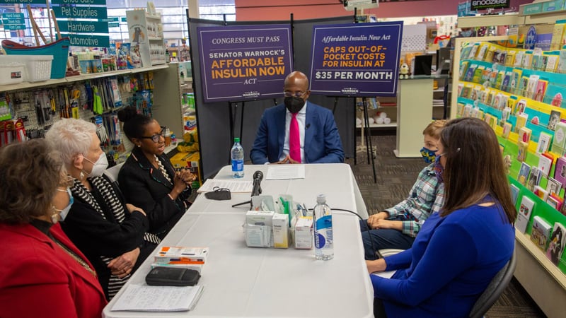 U.S. Sen. Warnock talks about his push for legislation to make insulin more affordable insulin act while visiting the Little Five Points Pharmacy on Monday 28, 2022. (Steve Schaefer for The Atlanta Journal-Constitution) 