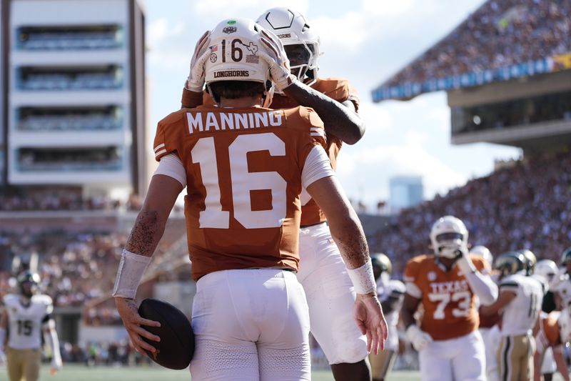 Texas quarterback Arch Manning (16) celebrates after scoring a touchdown against Colorado State during the second half of an NCAA college football game in Austin, Texas, Saturday, Aug. 31, 2024. (AP Photo/Eric Gay)