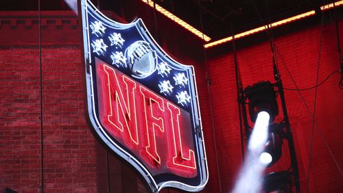 The NFL logo on the main stage during the second round of the NFL football draft, Friday, April 26, 2019, in Nashville.