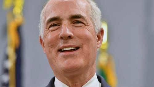 FILE - Sen. Bob Casey, D-Pa., smiles while speaking during an event at AFSCME Council 13 offices, March 14, 2024, in Harrisburg, Pa. Abortion rights, suddenly a potent political force in the aftermath of the U.S. Supreme Court's decision to leave such matters to the states, have found an unlikely champion in swing-state Pennsylvania. Casey, who will appear on the November ballot beneath President Joe Biden as they both seek reelection, has begun doing something he's never done before: attacking an opponent over abortion rights. (AP Photo/Marc Levy, File)
