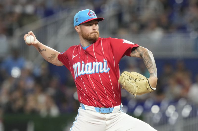 Miami Marlins starting pitcher Adam Oller (77) aims a pitch during the first inning of a baseball game against the Atlanta Braves, Saturday, Sept. 21, 2024, in Miami. (AP Photo/Marta Lavandier)