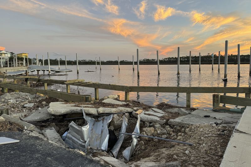 The sun sets over the storm-damaged Steinhatchee marina near where the Steinhatchee River flows into the Gulf of Mexico, Sunday, Sept. 29, 2024, in the aftermath of Hurricane Helen. (AP Photo/Kate Payne) Kate Payne Reporter, State Government Education Tallahassee, FL C 850.545.4283 kpayne@ap.or