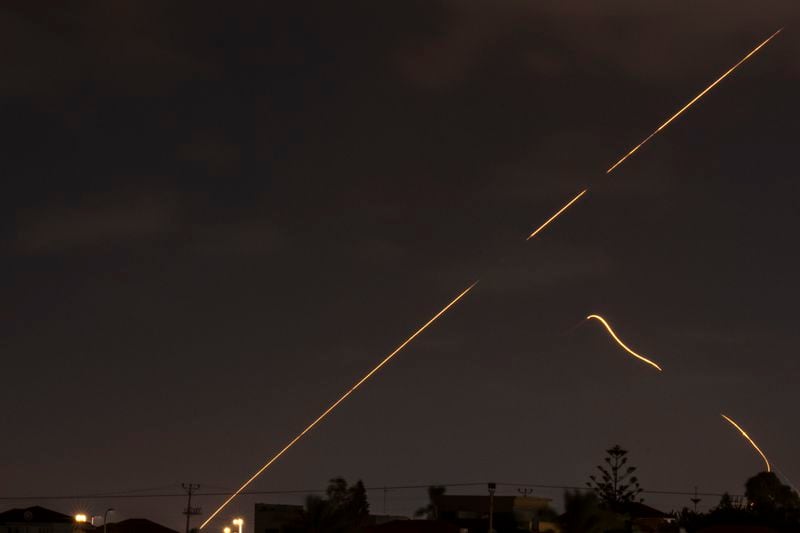 Israeli air defense system fires to intercept missiles over Hadera, Israel Tuesday, Oct. 1, 2024. (AP Photo/Ariel Schalit)