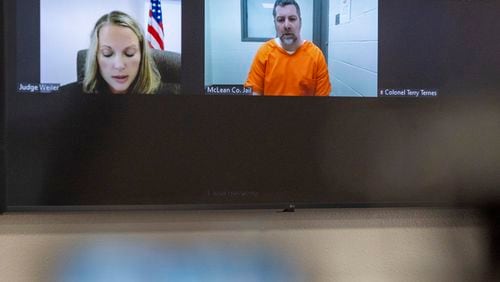 Morton County District Judge Bobbi Keller, left, and Ian Cramer, right, appear over a zoom call during a plea change hearing at the Morton County Courthouse on Friday, Sept. 20, 2024, in Mandan, N.D. (Tanner Ecker/The Bismarck Tribune via AP)