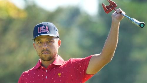 United States team member Xander Schauffele reacts after making a birdie on the first hole during their fifth round singles match at the Presidents Cup golf tournament at Royal Montreal Golf Club on Sunday, Sept. 29, 2024, in Montreal. (Frank Gunn/The Canadian Press via AP)