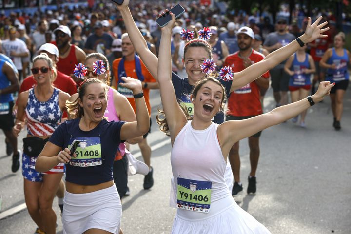 Runners start the 55th Atlanta Journal-Constitution Peachtree Road Race in Atlanta on Thursday, July 4, 2024.  (Arvin.Temkar / ajc.com)

