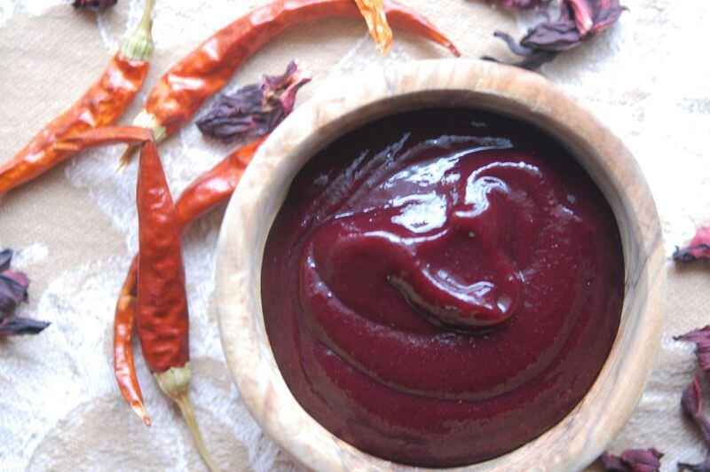 The flavor of Mexican chamoy is heightened with hibiscus and chiles. (Styling and photo by Meridith Ford for The Atlanta Journal-Constitution)