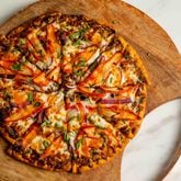 Chili paneer pizza is one of several Indian-inspired pizzas on the menu at Tandoori Pizza and Wings. / Courtesy of Tandoori Pizza and Wings