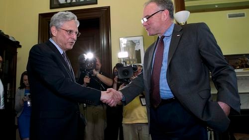 Judge Merrick Garland, left, President Barack Obama's choice to replace the late Justice Antonin Scalia on the Supreme Court, meets with Sen. Tim Kaine, D-Va., at Capitol Hill in Washington, Thursday, April 21, 2016. ( AP Photo/Jose Luis Magana)