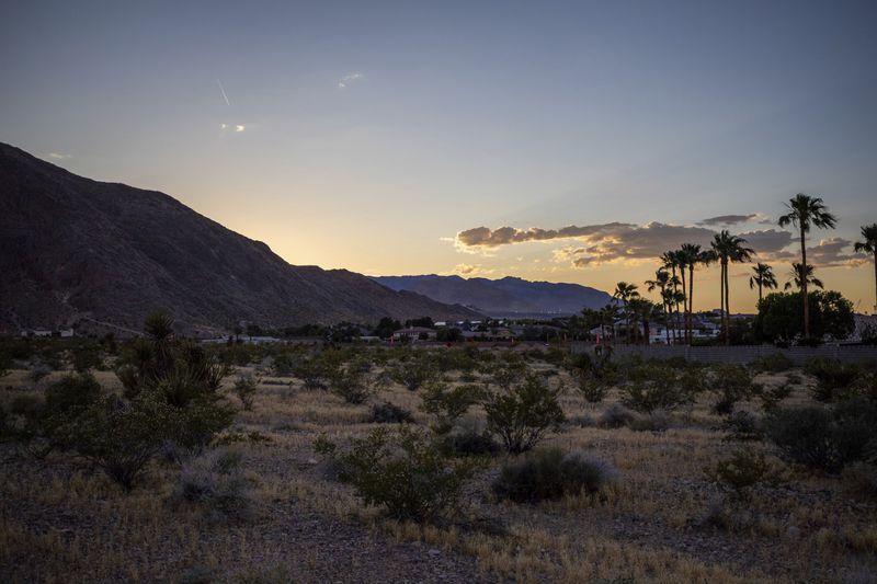 The sun sets over the site where The Church of Jesus Christ of Latter-day Saints plans to build a new temple near Las Vegas, May 13, 2024. (AP Photo/Ty ONeil)