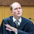 Judge Scott McAfee presides over a hearing regarding media access in the case against former President Donald Trump and 18 others at the Fulton County Courthouse in Atlanta on Aug. 31, 2023. (Arvin Temkar/The Atlanta Journal-Constitution/TNS)