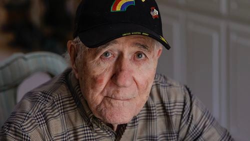 World War II veteran and liberator Hilbert “Hibby” Margol poses for a photo at his home in Dunwoody on Wednesday, Jan. 17, 2024.  (Natrice Miller/ Natrice.miller@ajc.com)