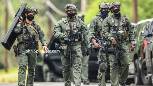 DeKalb County SWAT officers were called to the scene after a man refused to come out of a home on Sherrington Drive, according to police.