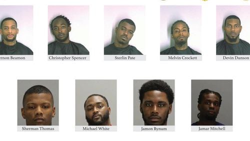 Officials released photos of nine of 12 men charged in the 2016 killing of two children on Libby Lane in Clayton County in a suspected gang retaliation attack.