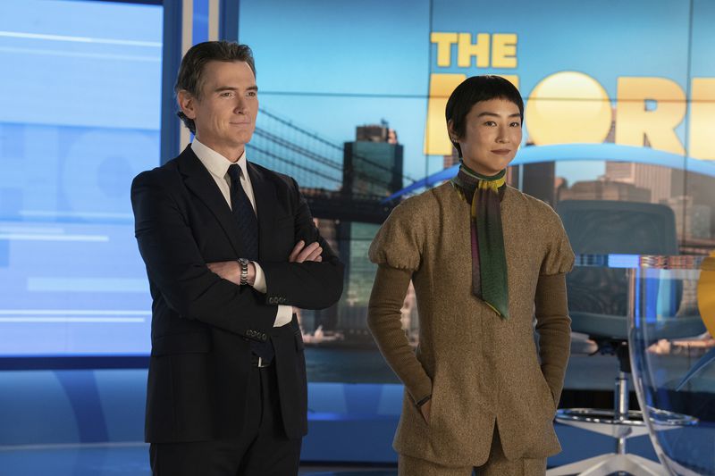 This image released by Apple TV+ shows Billy Crudup, left, and Greta Lee in a scene from "The Morning Show." (Apple TV+ via AP)