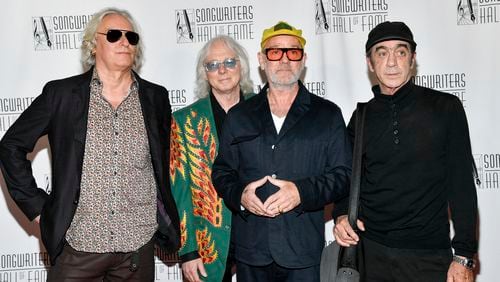R.E.M. band members, from left, Peter Buck, Mike Mills, Michael Stipe and Bill Berry attend the Songwriters Hall of Fame Induction and Awards Gala at the New York Marriott Marquis Hotel on Thursday, June 13, 2024, in New York. (Photo by Evan Agostini/Invision/AP)