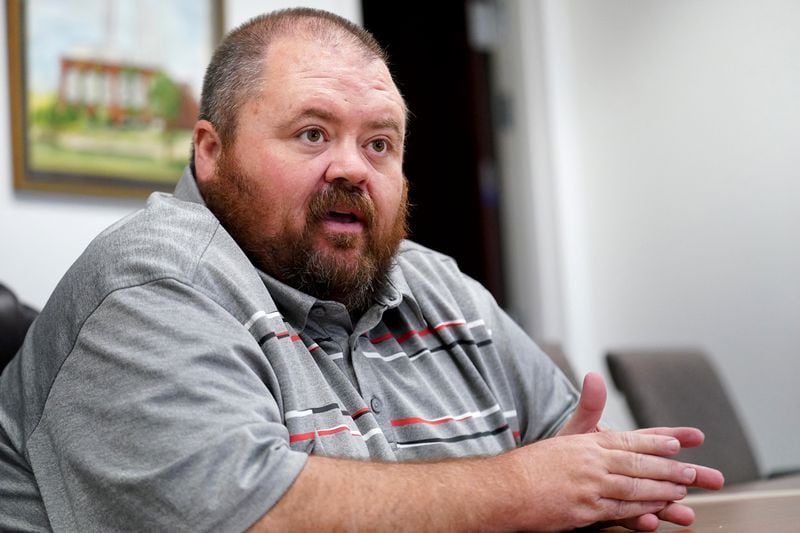 East Palestine, Ohio Mayor Trent Conaway discusses the Feb. 3 Norfolk Southern freight train derailment, Saturday, July 15, 2023, in East Palestine. (Matt Freed for the Atlanta Journal Constitution)