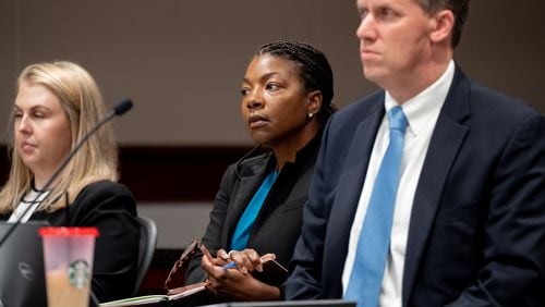 Board of Elections and Registration Chairwoman Tori Silas and attorney Daniel White listen in Cobb Superior Court during arguments over the county's district map on Thursday, June 20, 2024, in Marietta. (Ben Hendren for the Atlanta Journal-Constitution)