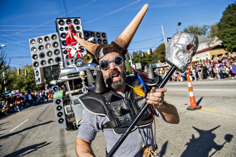 October 17, 2015 Atlanta - Ryan Vila (center) marches down Moreland Ave. during the Little Five Points Halloween Parade in Atlanta on Saturday, October 17, 2015. The annual parade brought out tens of thousands of people to watch the antics. JONATHAN PHILLIPS / SPECIAL