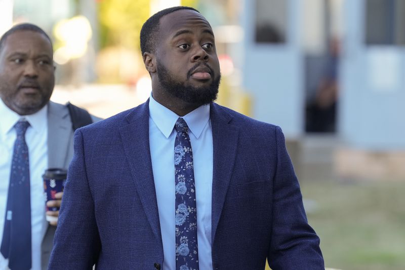 Tadarrius Bean, one of three former Memphis police officers charged in the 2023 fatal beating of Tyre Nichols, arrives at the federal courthouse for the day's proceedings Thursday, Oct. 3, 2024, in Memphis, Tenn. (AP Photo/George Walker IV)