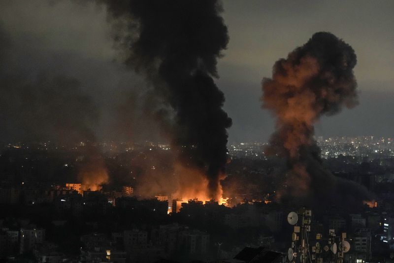 Flames and smoke rise from an Israeli airstrike in Dahiyeh, Beirut, Lebanon, early Monday, Oct. 7, 2024. (AP Photo/Bilal Hussein)