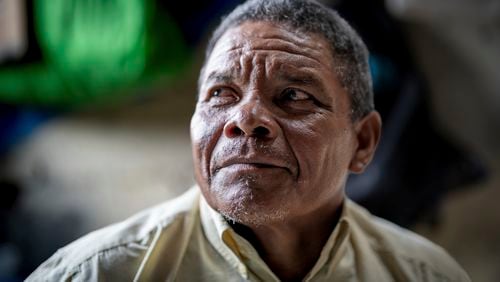 Nicaraguan exile Francisco Alvicio, a deacon of Nicaragua's Moravian Church, poses for a photo in his rented room in San Jose, Costa Rica, Sunday, Sept. 22, 2024. (AP Photo/Carlos Herrera)