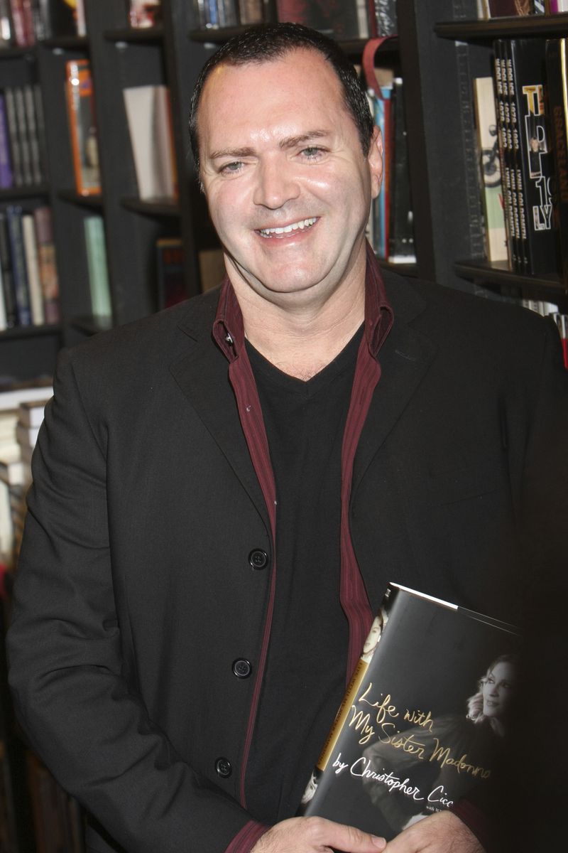 FILE - Christopher Ciccone poses with his memoir "Life With My Sister Madonna," Wednesday, July 30, 2008, in West Hollywood, Calif. (AP Photo/Rene Macura, File)