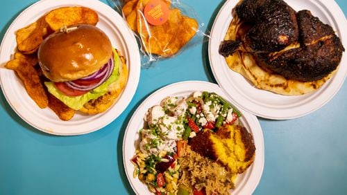 Nani’s Piri Piri Chicken at Ponce City Market offers menu options including Nani's Chicken Burger, Half Chicken, and sides with Piri Piri House Chips.  (Mia Yakel for The Atlanta Journal-Constitution)
