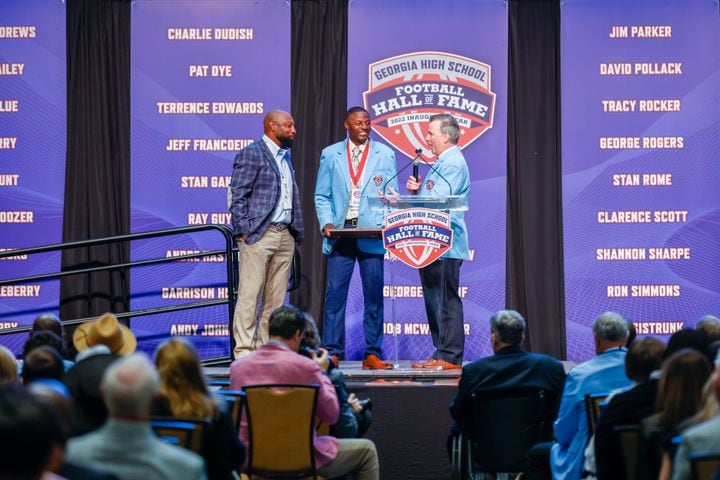 Takeo Spikes gives speech before GHSA title game 