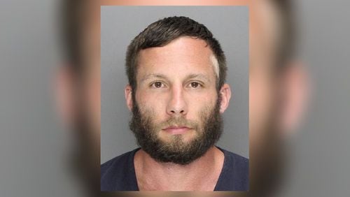 Austin Stovall, 33, of Woodstock, has been charged with rape, child molestation, kidnapping and other offenses related to an alleged sexual assault at Swift-Cantrell Park.