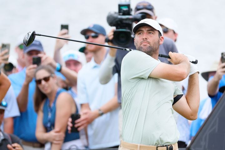 Scottie Scheffler tees off on the sixth hole during the final round of the Tour Championship at East Lake Golf Club, Sunday, Sept. 1, 2024, in Atlanta.
(Miguel Martinez / AJC)