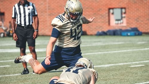 Georgia Tech kicker Brent Cimaglia attempts a placekick at a preseason practice at Bobby Dodd Stadium out of the hold of Austin Kent. (Georgia Tech Football)