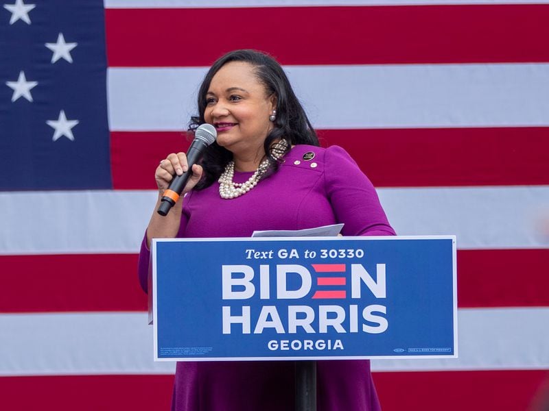 U.S. Rep. Nikema Williams, D-Ga., speaks at a Biden-Harris rally (right) in Decatur. Williams is now backing Vice President Kamala Harris for president.