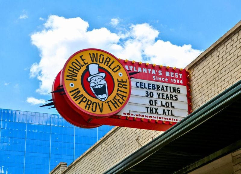 Some drivers stuck in Midtown traffic have likely laughed out loud -- or at least chuckled -- at Whole World Improv Theatre's marquee message.