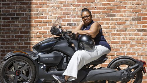 United Methodist Church Bishop Robin Dease poses for a portrait with her motorcycle at her home in Atlanta on Friday, May 26, 2023. Dease must lead one of the nation’s largest conferences of United Methodist churches through disagreements over the ordination of non-celibate gay clergy and same-sex marriages. When she's not working, she enjoys riding her three-wheeled motorcycle. CHRISTINA MATACOTTA FOR THE ATLANTA JOURNAL-CONSTITUTION.