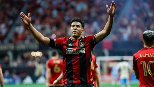 Atlanta United defender Caleb Wiley (26) celebrates with the fans after scoring his team’s second goal during the second half against the Philadelphia Union on Sunday, April 14, 2024.
 Miguel Martinez / miguel.martinezjimenez@ajc.com