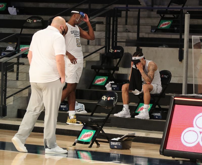 Georgia Tech guard Jose Alvarado (right) sits dejected on the bench after the game.  “Curtis Compton / Curtis.Compton@ajc.com”